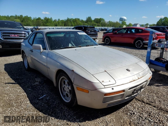 1986 Porsche 944 z VIN WP0AA0954GN155776, wystawiony jako Copart lot #56032785 z przebiegiem 17 696 mil mil oraz Szkoda całkowita • Salvage title. Historia ofert i sprzedaży dostępna na DreamBid. Obrazek 4.