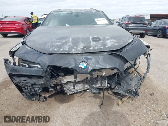 2023 BMW 7 Series 740i with VIN WBA23EH05PCM58771, listed as a IAAI auction lot 42024556 with Not provided miles and . Bid and sale history available at DreamBid. Image 11.