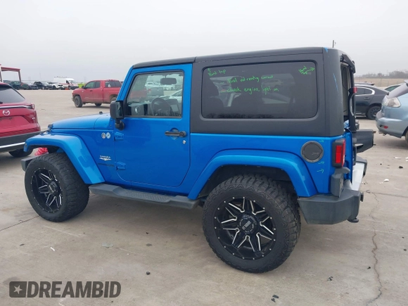 2014 Jeep Wrangler Arctic z VIN 1C4GJWBG3EL313350, wystawiony jako IAAI lot #41442520 z przebiegiem Nie podano mil oraz . Historia ofert i sprzedaży dostępna na DreamBid. Obrazek 14.