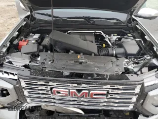 2024 GMC Canyon 4WD Denali with VIN 1GTP6FEKXR1248564, listed as a Copart auction lot 43116895 with 7,044 mi miles and Salvage Title. Bid and sale history available at carsss.com. Image 13.