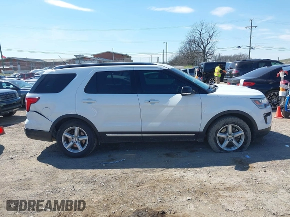 2018 Ford Explorer XLT z VIN 1FM5K7D85JGC71116, wystawiony jako IAAI lot #41901774 z przebiegiem 68 957 mil mil oraz . Historia ofert i sprzedaży dostępna na DreamBid. Obrazek 13.