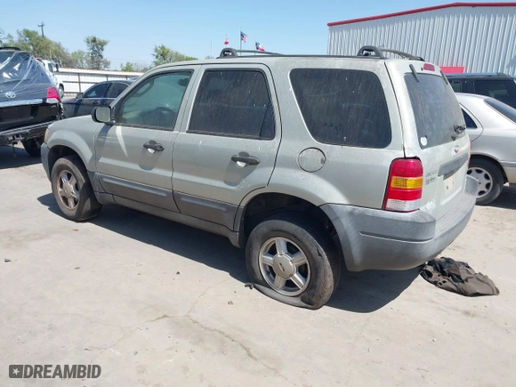 2003 Ford Escape XLS Popular with VIN 1FMYU02103KE20195, listed as a IAAI auction lot 41830663 with 262,580 mi miles. Bid and sale history available at carsss.com. Image 3.