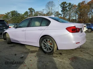 2018 BMW 3 Series 320i with VIN WBA8A9C55JAH12818, listed as a Copart auction lot 52110515 with 72,522 mi miles and Salvage title. Bid and sale history available at DreamBid. Image 2.