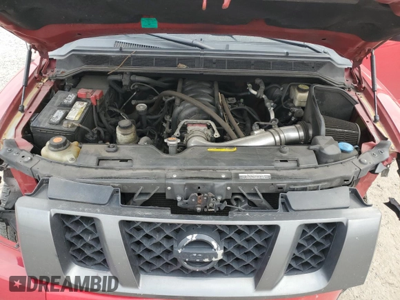 2012 Nissan Titan SV with VIN 1N6BA0EK4CN319941, listed as a Copart auction lot 43640705 with 210,885 mi miles and Salvage Title. Bid and sale history available at DreamBid. Image 11.