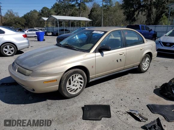 1999 Saturn SL с VIN 1G8ZK527XXZ111390, выставлен на аукционе Copart как лот 49042185 с пробегом 164 733 миль миль и Списание • Salvage title. История ставок и продаж доступна на DreamBid. Изображение 1.