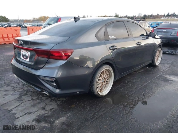 2021 Kia Forte LXS with VIN 3KPF24AD3ME343735, listed as a IAAI auction lot 40950634 with 77,818 mi miles. Bid and sale history available at carsss.com. Image 4.