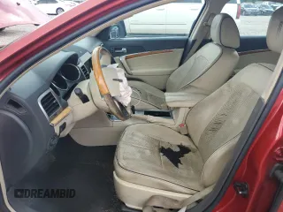 2010 Lincoln MKZ z VIN 3LNHL2GC7AR650494, wystawiony jako Copart lot #55113205 z przebiegiem 187 116 mil mil oraz Szkoda całkowita • Salvage title. Historia ofert i sprzedaży dostępna na DreamBid. Obrazek 7.