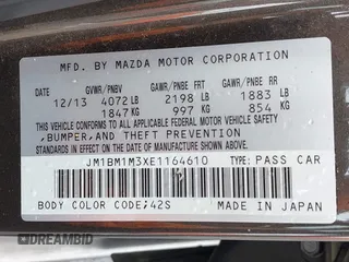 2014 Mazda 3 S Grand Touring with VIN JM1BM1M3XE1164610, listed as a IAAI auction lot 42421946 with 96,591 mi miles and . Bid and sale history available at DreamBid. Image 9.