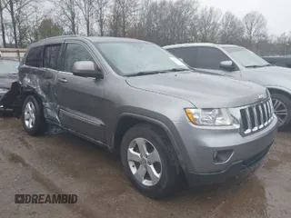2012 Jeep Grand Cherokee Laredo with VIN 1C4RJFAG0CC156545, listed as a IAAI auction lot 41909296 with 170,033 mi miles. Bid and sale history available at carsss.com. Image 1.