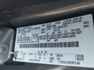 2014 Ford Escape Titanium with VIN 1FMCU9JX1EUB94776, listed as a IAAI auction lot 42063678 with 138,036 mi miles. Bid and sale history available at carsss.com. Image 9.