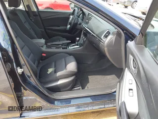 2015 Mazda 6 i Sport with VIN JM1GJ1U52F1201571, listed as a IAAI auction lot 42096344 with 88,290 mi miles and . Bid and sale history available at DreamBid. Image 5.