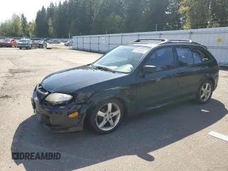 2002 Mazda Protege with VIN JM1BJ246121584776, listed as a Copart auction lot 53166525 with 177,206 mi miles and Salvage Title. Bid and sale history available at DreamBid. Image 1.