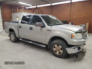 2006 Ford F-150 XLT with VIN 1FTPW14536KE03461, listed as a Copart auction lot 52998995 with 170,534 mi miles and Salvage Title. Bid and sale history available at carsss.com. Image 4.