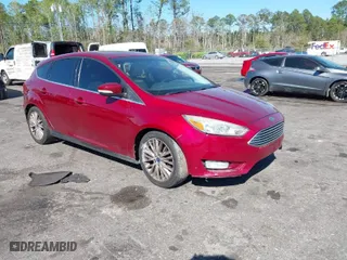2015 Ford Focus Titanium with VIN 1FADP3N28FL215499, listed as a IAAI auction lot 41839092 with 152,102 mi miles. Bid and sale history available at carsss.com. Image 1.
