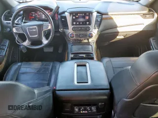 2015 GMC Yukon Denali with VIN 1GKS1CKJ7FR132677, listed as a Copart auction lot 47820925 with 144,821 mi miles and Salvage Title. Bid and sale history available at carsss.com. Image 8.