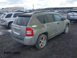 2007 Jeep Compass Sport with VIN 1J8FF47W17D142461, listed as a IAAI auction lot 41629674 with 153,516 mi miles. Bid and sale history available at carsss.com. Image 4.