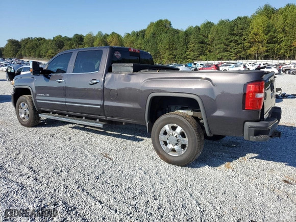 2015 GMC Sierra 3500HD Denali with VIN 1GT424E86FF533171, listed as a Copart auction lot 74837874 with 128,234 mi miles and Salvage Title. Bid and sale history available at carsss.com. Image 2.