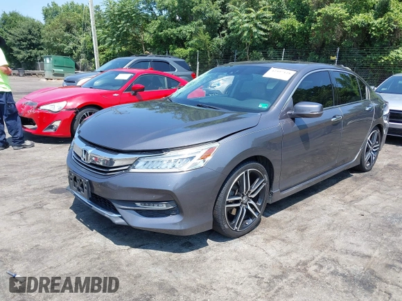 2016 Honda Accord Touring with VIN 1HGCR3F94GA009459, listed as a IAAI auction lot 42597128 with 182,977 mi miles and . Bid and sale history available at DreamBid. Image 18.