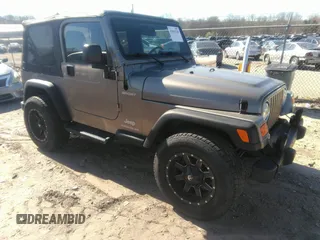 2003 Jeep Wrangler Sport with VIN 1J4FA49S53P365363, listed as a IAAI auction lot 41818320 with 154,567 mi miles. Bid and sale history available at carsss.com. Image 1.