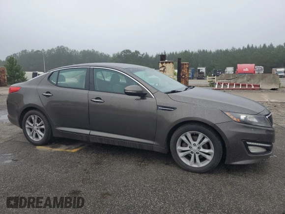 2013 Kia Optima EX z VIN 5XXGN4A70DG207530, wystawiony jako Copart lot #58270795 z przebiegiem 188 998 mil mil oraz Szkoda całkowita • Salvage title. Historia ofert i sprzedaży dostępna na DreamBid. Obrazek 4.