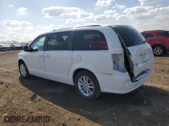 2019 Dodge Grand Caravan SXT with VIN 2C4RDGCG7KR663085, listed as a Copart auction lot 52530605 with 64,590 mi miles and Salvage Title. Bid and sale history available at DreamBid. Image 2.
