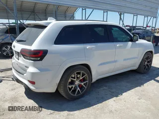 2017 Jeep Grand Cherokee SRT with VIN 1C4RJFDJ0HC699537, listed as a IAAI auction lot 41781500 with 105,640 mi miles. Bid and sale history available at carsss.com. Image 4.