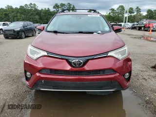 2018 Toyota RAV4 XLE with VIN 2T3WFREV7JW464160, listed as a Copart auction lot 63872925 with 70,826 mi miles and Salvage title. Bid and sale history available at DreamBid. Image 5.