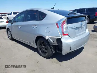 2013 Toyota Prius One with VIN JTDKN3DU1D5650005, listed as a IAAI auction lot 42040252 with 88,286 mi miles. Bid and sale history available at carsss.com. Image 3.