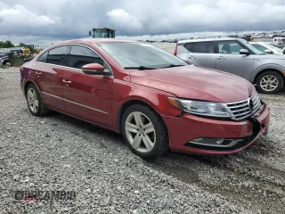 2013 Volkswagen CC Sport with VIN WVWBN7AN9DE549265, listed as a Copart auction lot 61805604 with 185,247 mi miles and Salvage Title. Bid and sale history available at carsss.com. Image 4.