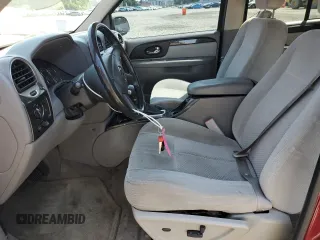 2007 GMC Envoy SLE z VIN 1GKDS13S472217245, wystawiony jako Copart lot #59190865 z przebiegiem 161 943 mil mil oraz Szkoda całkowita • Salvage title. Historia ofert i sprzedaży dostępna na DreamBid. Obrazek 7.