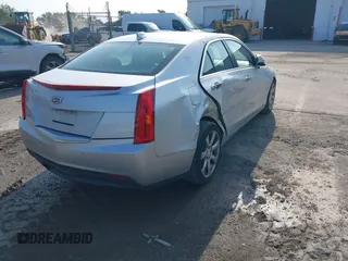 2015 Cadillac ATS Luxury RWD z VIN 1G6AB5RA6F0127029, wystawiony jako IAAI lot #42376359 z przebiegiem 131 823 mil mil oraz . Historia ofert i sprzedaży dostępna na DreamBid. Obrazek 4.