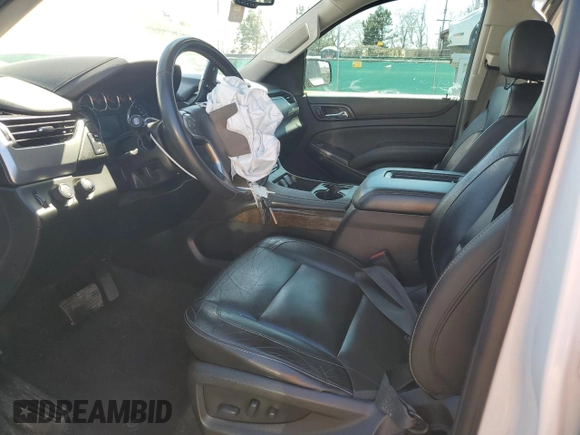 2019 Chevrolet Tahoe LT with VIN 1GNSKBKC5KR137818, listed as a Copart auction lot 50654885 with 138,334 mi miles and Salvage title. Bid and sale history available at DreamBid. Image 7.