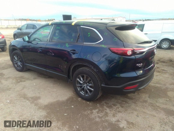 2021 Mazda CX-9 Sport with VIN JM3TCBBY4M0519407, listed as a IAAI auction lot 40883497 with 90,205 mi miles and . Bid and sale history available at carsss.com. Image 3.
