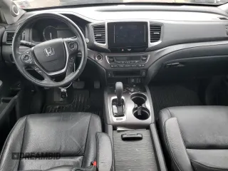 2018 Honda Pilot EX-L with VIN 5FNYF5H52JB023815, listed as a Copart auction lot 57692995 with 65,065 mi miles and Salvage title. Bid and sale history available at DreamBid. Image 8.