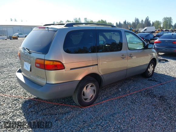 2000 Toyota Sienna LE with VIN 4T3ZF13C5YU227631, listed as a IAAI auction lot 42173057 with 154,152 mi miles and . Bid and sale history available at DreamBid. Image 4.
