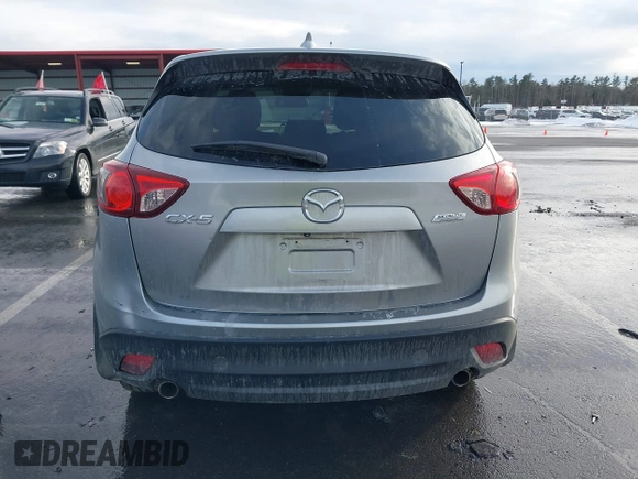 2014 Mazda CX-5 Grand Touring with VIN JM3KE2DY8E0304911, listed as a IAAI auction lot 41672197 with 77,523 mi miles. Bid and sale history available at carsss.com. Image 16.