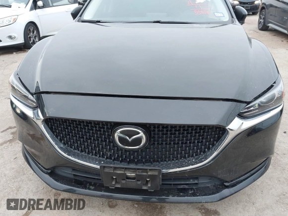 2020 Mazda 6 Grand Touring with VIN JM1GL1TY5L1513949, listed as a IAAI auction lot 40953540 with 55,616 mi miles and . Bid and sale history available at DreamBid. Image 12.