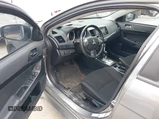 2016 Mitsubishi Lancer ES with VIN JA32U2FU4GU008977, listed as a IAAI auction lot 42139304 with 145,521 mi miles. Bid and sale history available at carsss.com. Image 14.