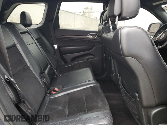 2018 Jeep Grand Cherokee Altitude z VIN 1C4RJEAG7JC392004, wystawiony jako Copart lot #53387525 z przebiegiem 103 406 mil mil oraz Szkoda całkowita • Salvage title. Historia ofert i sprzedaży dostępna na DreamBid. Obrazek 12.