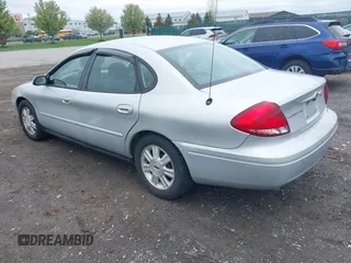 2005 Ford Taurus SEL z VIN 1FAFP56245A233415, wystawiony jako IAAI lot #42225619 z przebiegiem 145 658 mil mil oraz . Historia ofert i sprzedaży dostępna na DreamBid. Obrazek 3.