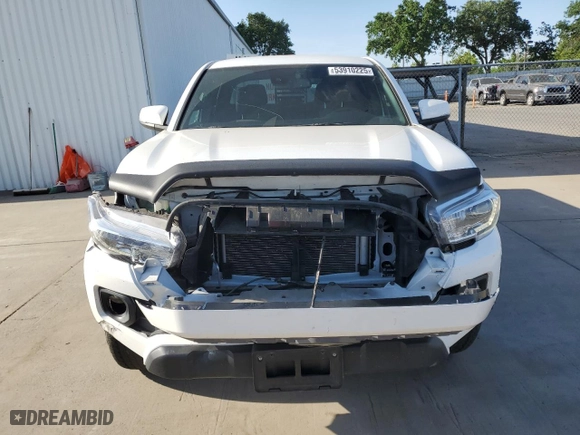 2023 Toyota Tacoma 4WD SR with VIN 3TMCZ5AN9PM638538, listed as a Copart auction lot 53910225 with 29,464 mi miles and Salvage Title. Bid and sale history available at carsss.com. Image 5.