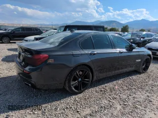 2011 BMW 7 Series 750i with VIN WBAKA8C59BCY36660, listed as a Copart auction lot 64260145 with 121,047 mi miles and Clean title. Bid and sale history available at DreamBid. Image 3.