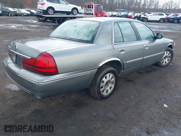 2003 Mercury Grand Marquis LS Premium with VIN 2MEFM75WX3X634344, listed as a IAAI auction lot 41888397 with 129,651 mi miles and . Bid and sale history available at DreamBid. Image 4.