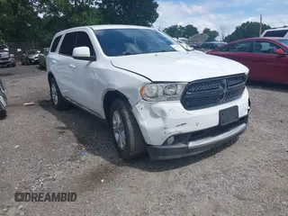 2013 Dodge Durango Special Service with VIN 1C4RDJFG4DC675358, listed as a IAAI auction lot 42443882 with 94,889 mi miles and . Bid and sale history available at DreamBid. Image 1.