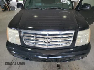 2006 Cadillac Escalade z VIN 1GYEK63N56R139033, wystawiony jako Copart lot #59661465 z przebiegiem Nie podano mil oraz Czysty tytuł • Clean title. Historia ofert i sprzedaży dostępna na DreamBid. Obrazek 12.
