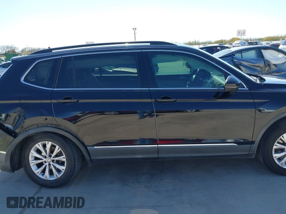 2018 Volkswagen Tiguan SEL with VIN 3VV3B7AX3JM064061, listed as a IAAI auction lot 41772564 with 95,395 mi miles and . Bid and sale history available at DreamBid. Image 13.