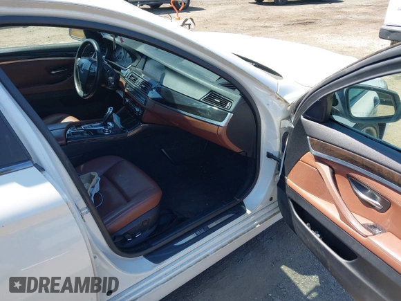 2013 BMW 5 Series 535i with VIN WBAFR7C54DC819983, listed as a IAAI auction lot 42141306 with 135,938 mi miles and . Bid and sale history available at carsss.com. Image 5.