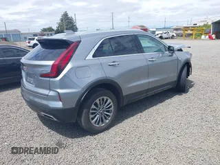 2024 Cadillac XT4 AWD Premium Luxury with VIN 1GYFZDR40RF141281, listed as a IAAI auction lot 42585681 with Not provided miles and . Bid and sale history available at DreamBid. Image 4.