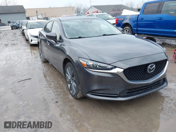 2020 Mazda 6 Grand Touring with VIN JM1GL1TYXL1524543, listed as a IAAI auction lot 41474337 with 52,160 mi miles and . Bid and sale history available at DreamBid. Image 1.