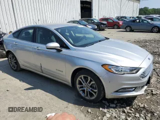 2017 Ford Fusion Hybrid SE with VIN 3FA6P0LU1HR403281, listed as a Copart auction lot 61362815 with 73,107 mi miles and Salvage title. Bid and sale history available at DreamBid. Image 4.